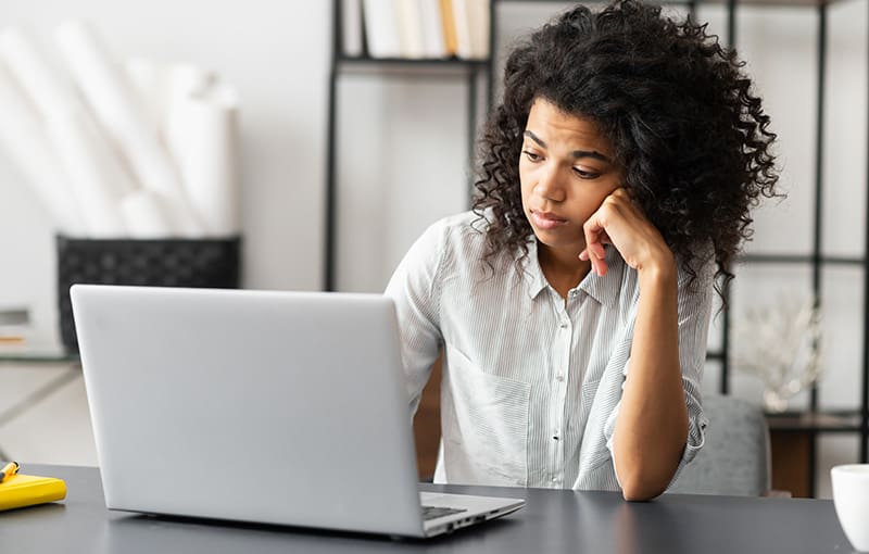 Sleepy African American female feeling bored
