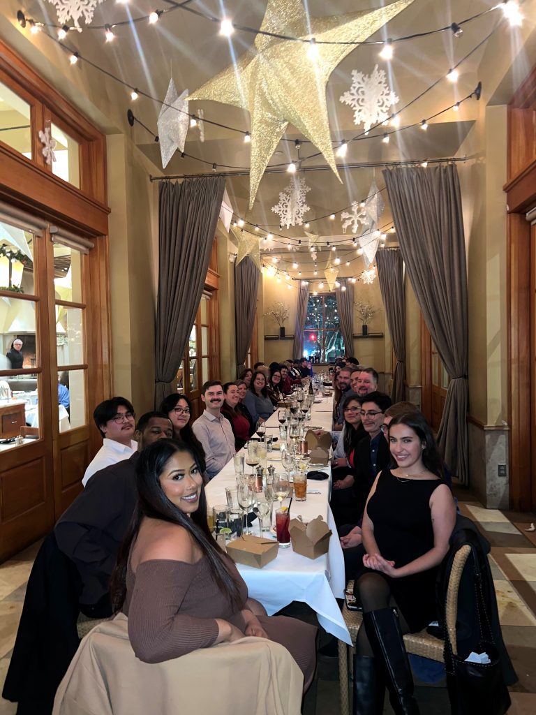 Our whole team having dinner together.